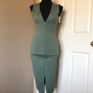 Madrag Sage Green Midi dress with a slit up the front center.